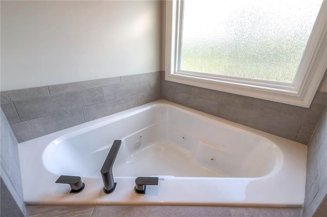 bathroom featuring a washtub