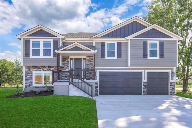 view of front of home with a porch, a front yard, and a garage