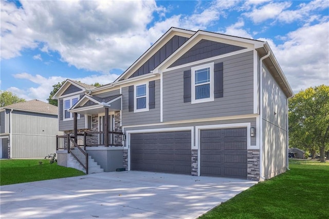 view of front facade with a front yard and a garage