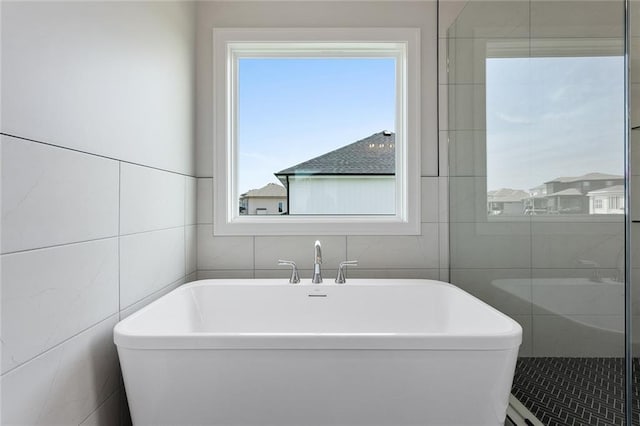 13424 W 178th St, Overland Park, KS 66013 - full bath with tile walls, a freestanding tub, and a shower stall
