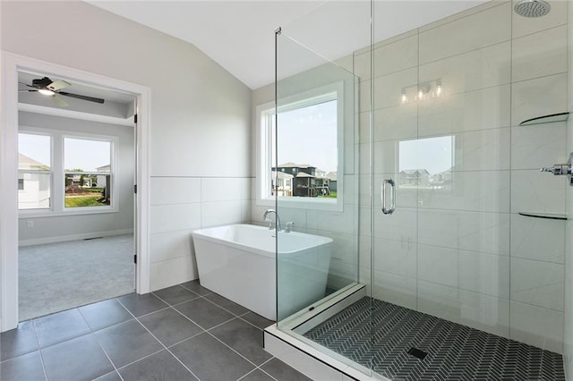 13424 W 178th St, Overland Park, KS 66013 - bathroom featuring tile patterned floors, a freestanding tub, a shower stall, lofted ceiling, and a ceiling fan