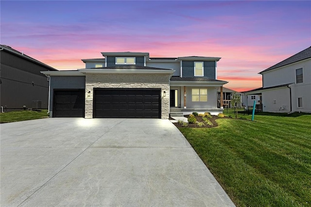 13424 W 178th St, Overland Park, KS 66013 - view of front of home with a garage, concrete driveway, a lawn, a porch, and stone siding