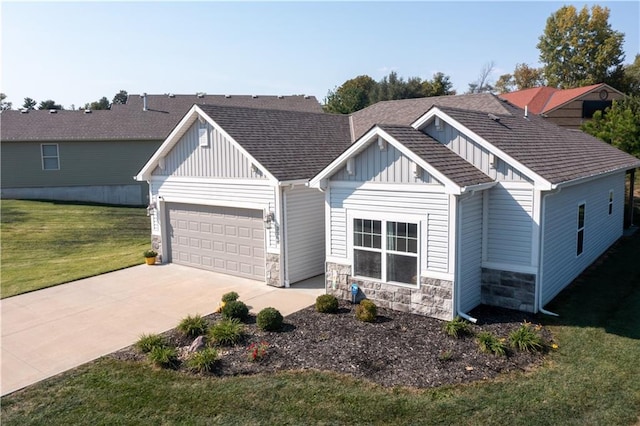 craftsman inspired home with a front yard and a garage