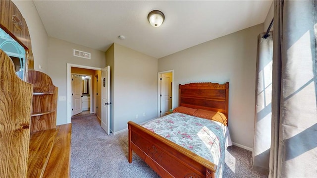 bedroom featuring carpet