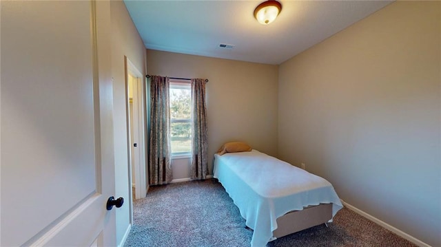 bedroom featuring carpet