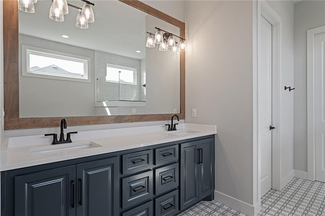 bathroom with vanity and tile patterned floors