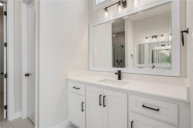 bathroom featuring vanity and a shower with shower door