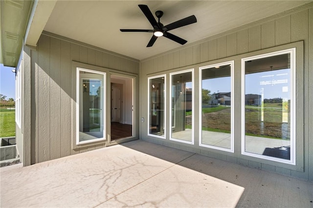 view of patio / terrace featuring ceiling fan