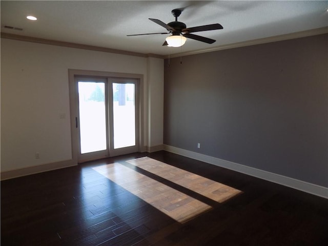 unfurnished room with ceiling fan, dark hardwood / wood-style floors, and ornamental molding