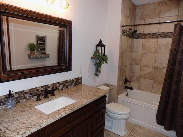 full bathroom with tasteful backsplash, tile patterned flooring, toilet, vanity, and shower / tub combo