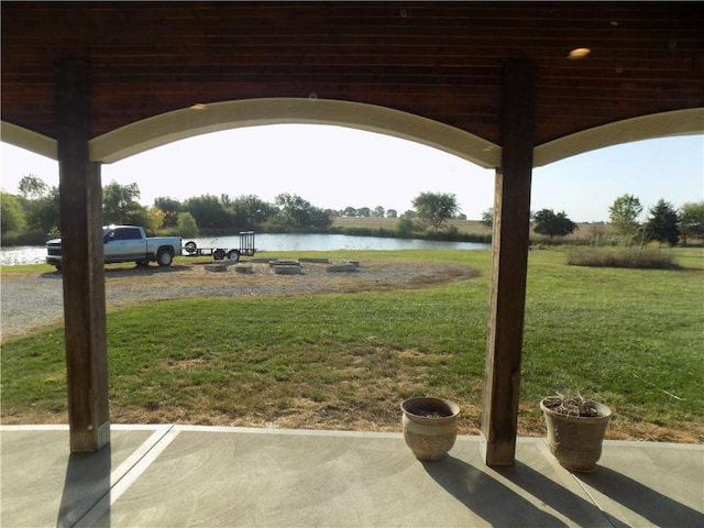 view of yard with a water view