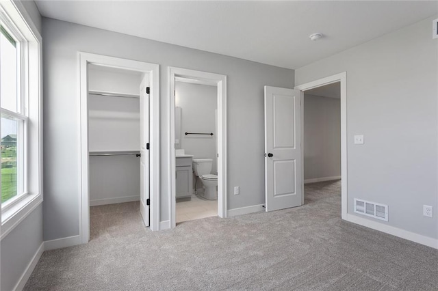 13428 W 178th St, Overland Park, KS 66013 - unfurnished bedroom with carpet flooring, a walk in closet, a closet, and ensuite bathroom