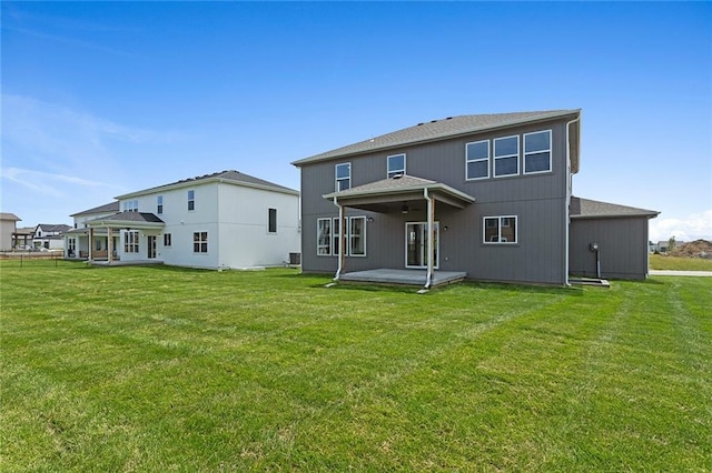 13428 W 178th St, Overland Park, KS 66013 - back of property with a patio area and a yard