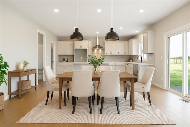 13428 W 178th St, Overland Park, KS 66013 - dining room featuring light wood-style floors and recessed lighting