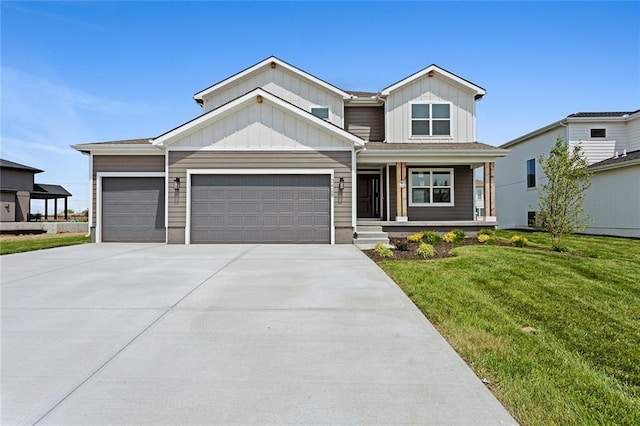 13428 W 178th St, Overland Park, KS 66013 - view of front of house featuring board and batten siding, covered porch, a front yard, driveway, and a garage