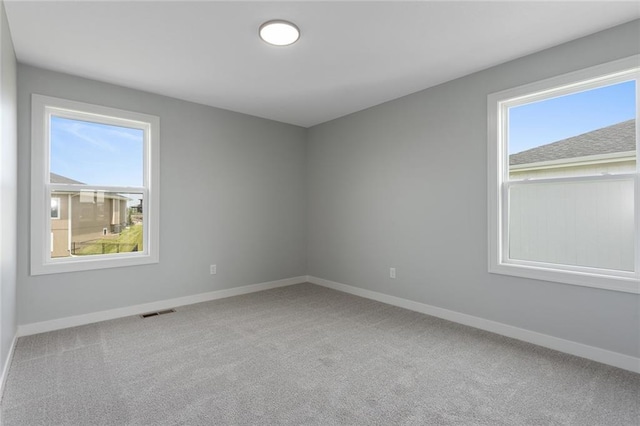 13428 W 178th St, Overland Park, KS 66013 - carpeted spare room with plenty of natural light