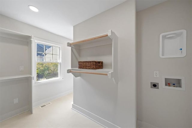 8301 Lee Blvd, Leawood, KS 66206 - clothes washing area featuring electric dryer hookup, baseboards, visible vents, laundry area, and hookup for a washing machine