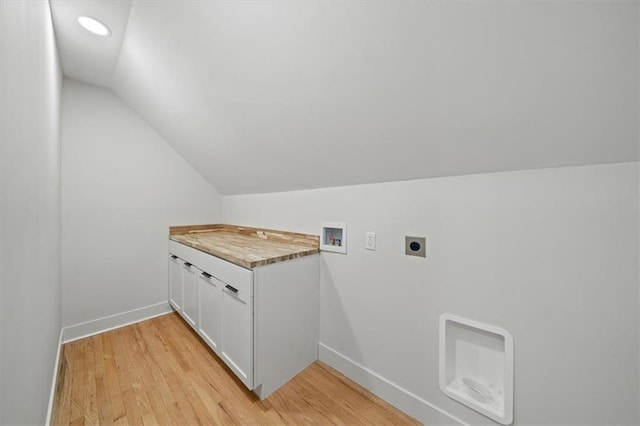8301 Lee Blvd, Leawood, KS 66206 - laundry room with light wood-type flooring, electric dryer hookup, washer hookup, and baseboards