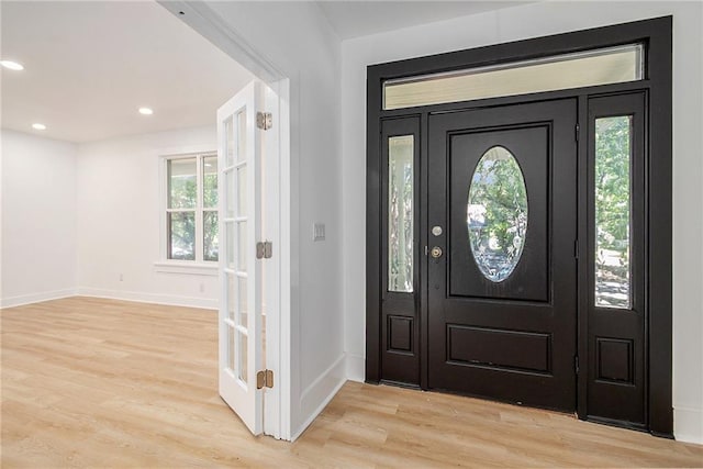 entryway with light wood-type flooring