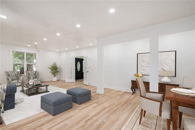 living room with light hardwood / wood-style floors