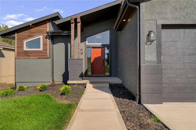 entrance to property featuring a garage