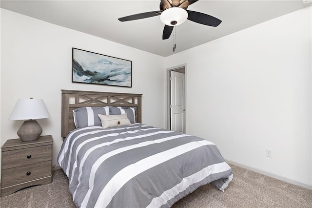 bedroom with carpet floors, ceiling fan, and baseboards