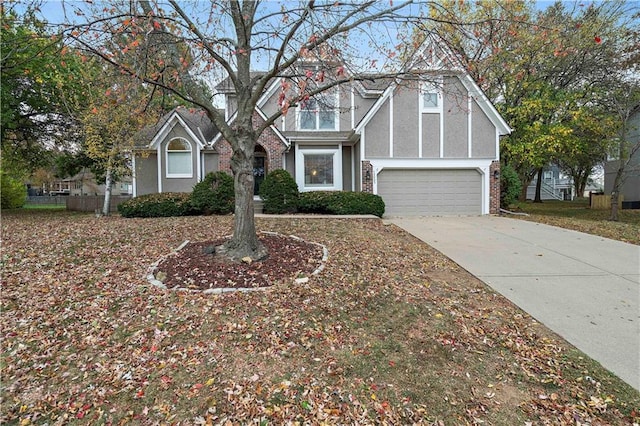 tudor-style house with a garage