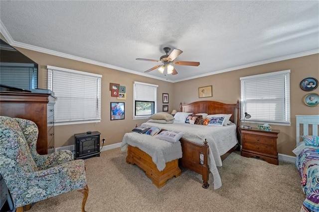 carpeted bedroom with a textured ceiling, ornamental molding, and a wood stove