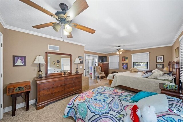 bedroom featuring visible vents, ornamental molding, carpet, and ceiling fan