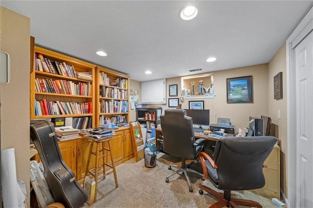 carpeted office space featuring recessed lighting