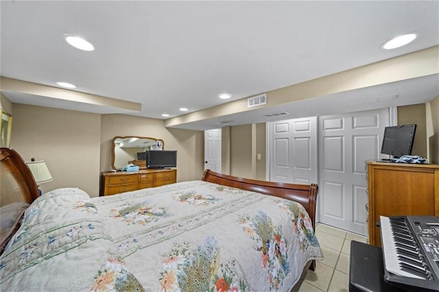 bedroom featuring recessed lighting, light tile patterned flooring, and visible vents