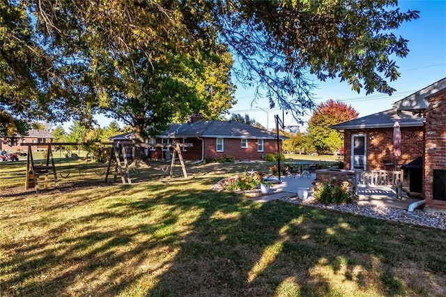 view of yard with a patio area