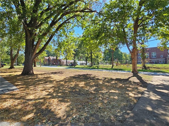 view of home's community featuring volleyball court