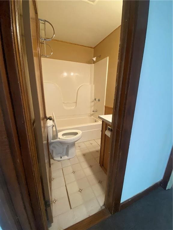 full bathroom featuring shower / bathing tub combination, tile patterned floors, vanity, and toilet