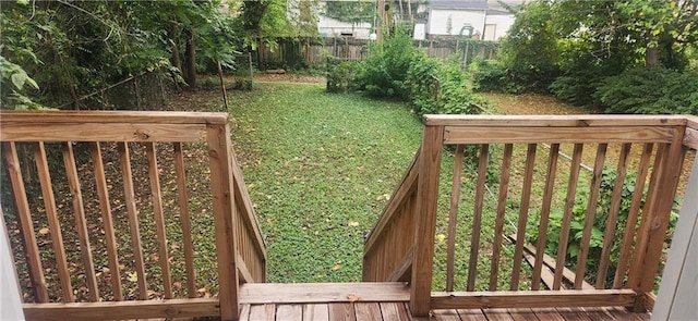 view of gate featuring a yard