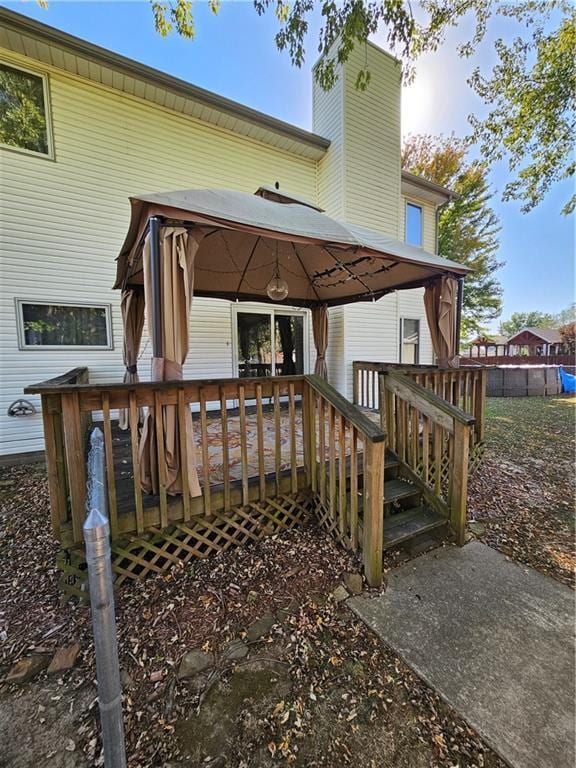 2007 Windsor Dr, Pittsburg, KS 66762 - exterior space with a deck, a gazebo, and a chimney