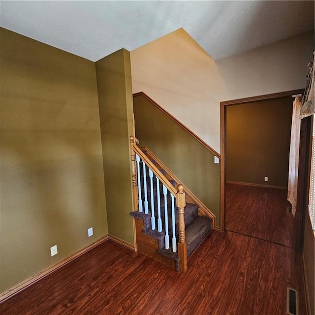 2007 Windsor Dr, Pittsburg, KS 66762 - stairs featuring wood finished floors, visible vents, and baseboards