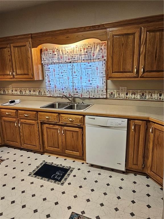 kitchen featuring dishwasher and sink