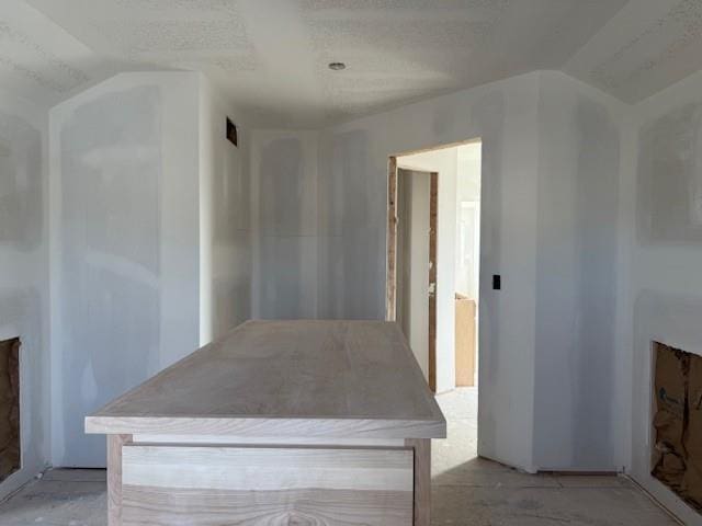 interior space featuring lofted ceiling