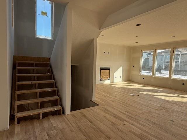 staircase featuring hardwood / wood-style floors