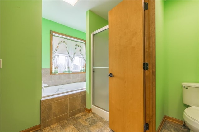 bathroom with toilet and plus walk in shower