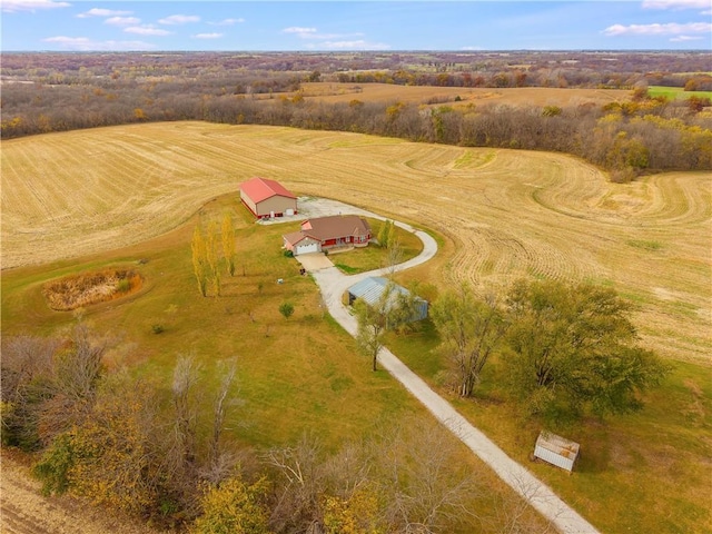 birds eye view of property featuring a rural view