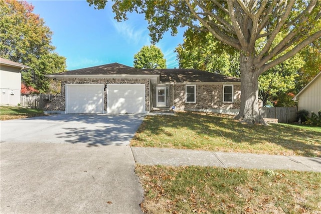 ranch-style house with a front lawn and a garage