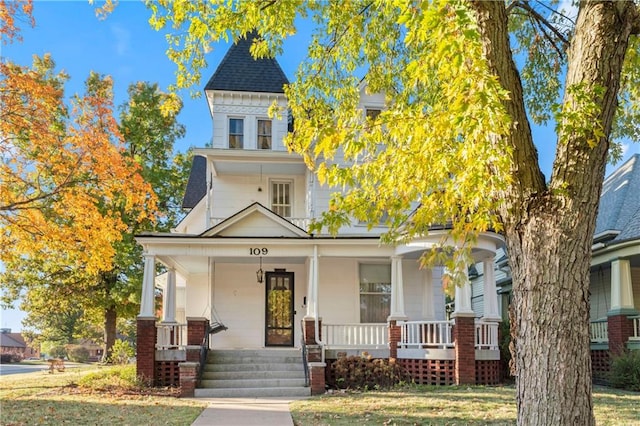 victorian home featuring covered porch