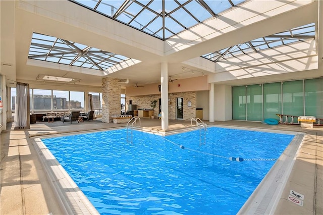 view of swimming pool featuring an outdoor hangout area, a patio, and ceiling fan