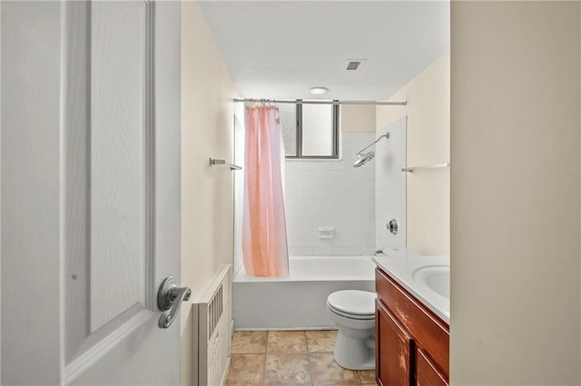 full bathroom featuring vanity, toilet, and shower / tub combo with curtain