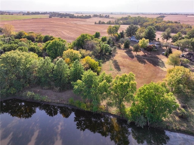 birds eye view of property featuring a rural view and a water view