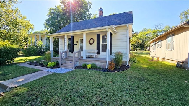 bungalow-style house featuring a front yard and a porch