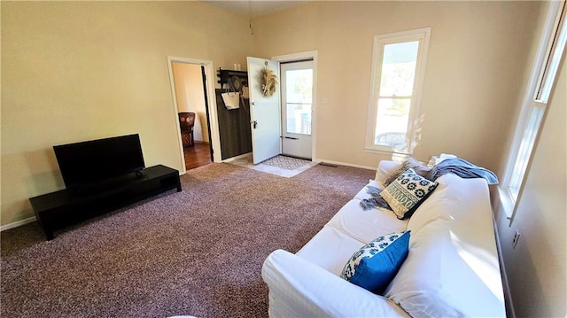 living room featuring light carpet