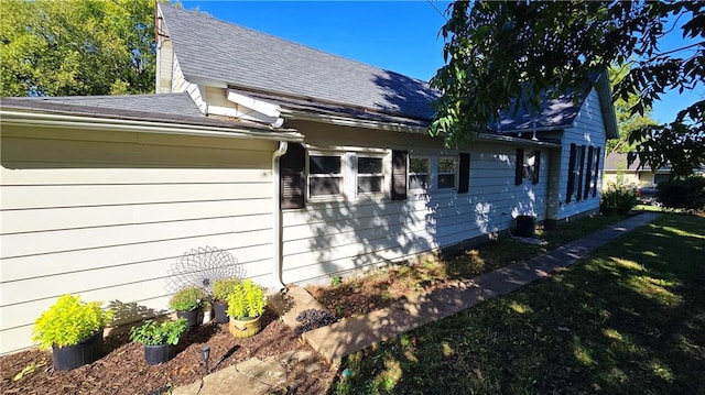 view of property exterior featuring a yard